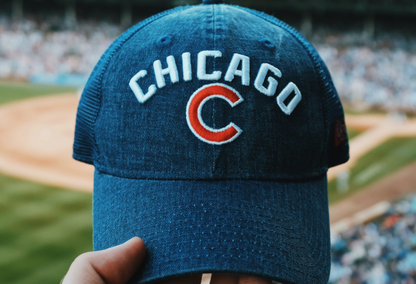 chicago hat at a baseball game